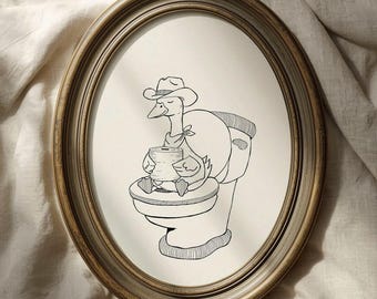 May include: Oval framed artwork featuring a whimsical illustration of a goose wearing a cowboy hat and bandana, seated on a toilet. The black and white drawing has a vintage aesthetic, perfect for a bathroom or novelty decor.