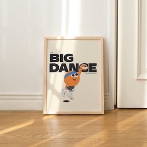 May include: A framed print with a white background and a cartoon illustration of an orange character dancing. The text "The Big Dance" is printed in black letters.