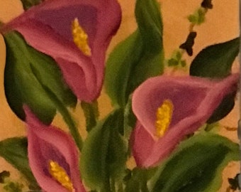 3 Berry Calla Lilies in vase with ivy