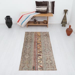 Vintage Turkish Oushak Rug: Small Faded Wool Rug (2x5 ft)