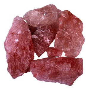 May include: A group of red Himalayan salt rocks, with a variety of shapes and sizes. The salt rocks have a rough, textured surface and a deep red color.
