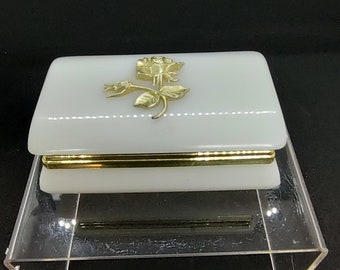 Vintage celluloid hinged lidded jewelry vanity box.