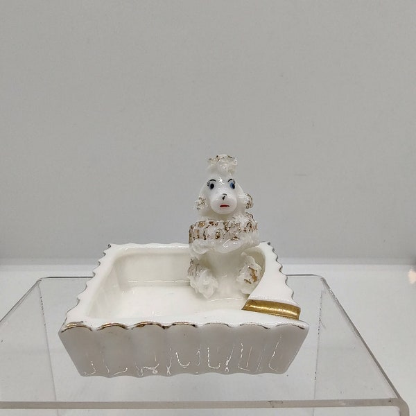 Small Kitschy Spaghetti Poodle ashtray.