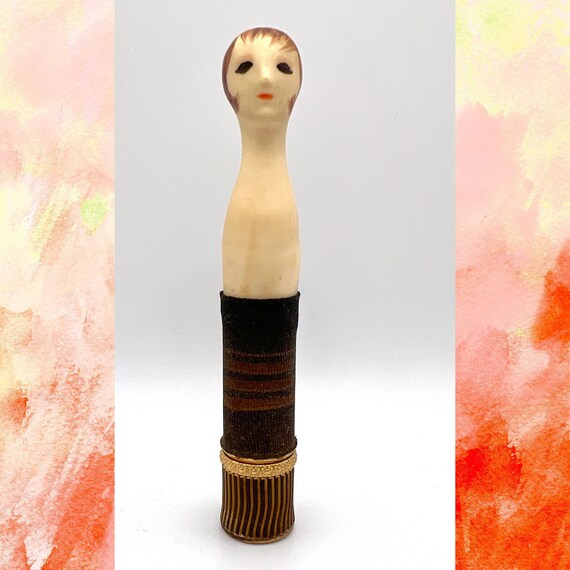 1961 Revlon ‘Couturine’ lipstick doll - unused novelty lipstick case. Mod cosmetics vintage lipstick collectible item. 