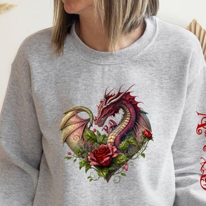 Abraxos Throne of Glass Rose Sweatshirt, Manon&#39;s wyvern in the roses with his name flying down the left sleeve from Sarah J. Maas&#39; series!