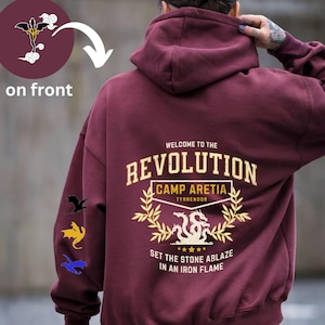 Sudadera con capucha Iron Flame Revolution edición dorada, llamativo escudo dorado de Revolution, nuestros 3 dragones favoritos de Fourth Wing en la manga, Tairn/Andarna en el frente
