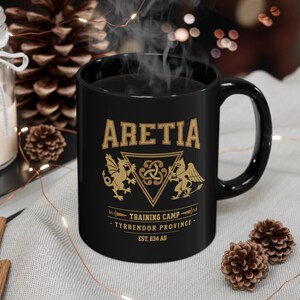 Aretia Training Camp Iron Flame 11 oz or 15 oz Black Mug, perfect for re-reading Rebecca Yarros&#39; Fourth Wing series or studying like Violet