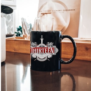 Wing Leader and The Thirteen Throne of Glass 11 oz Black Mug, for Manon Blackbeak and her coven The Thirteen from the Sarah J Maas series