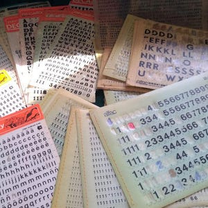 PACOTE SURPRESA - muitas letras de transferência de tipografia vintage letraset mecanorma decadry já usadas