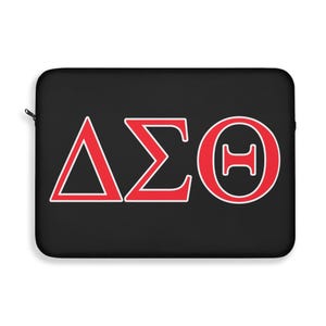 May include: Black laptop sleeve featuring the Greek letters Delta, Sigma, and Theta in red with white outlines. The letters are centered on the sleeve. A black zipper is visible on the left side of the sleeve.