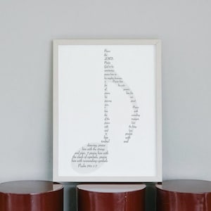 May include: A framed print of a musical note made up of the words "Praise the LORD" and a Bible verse from Psalm 150:1-5.
