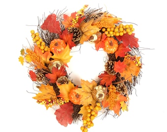 May include: A fall-themed wreath with a circular design. The wreath features a variety of autumn elements, including orange and red leaves, small pumpkins, pinecones, and golden berries. The base of the wreath is made of brown twigs.