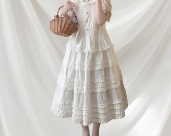 Loose cotton strap dress with ruffle trim