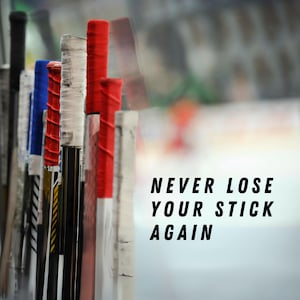 ow of hockey sticks with personalized toppers, showing how custom end caps help players never lose or mix up their sticks.