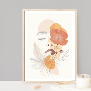 Puede incluir: Impresión de arte abstracto con un rostro estilizado con los ojos cerrados y una flor que cubre un ojo. La impresión es en tonos de naranja, marrón y blanco.