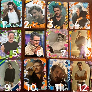 May include: A collection of twelve decorative cards, each featuring a different image of a man. The cards are rectangular and adorned with colorful borders, including floral, star, and other decorative elements. The images vary in style and pose.