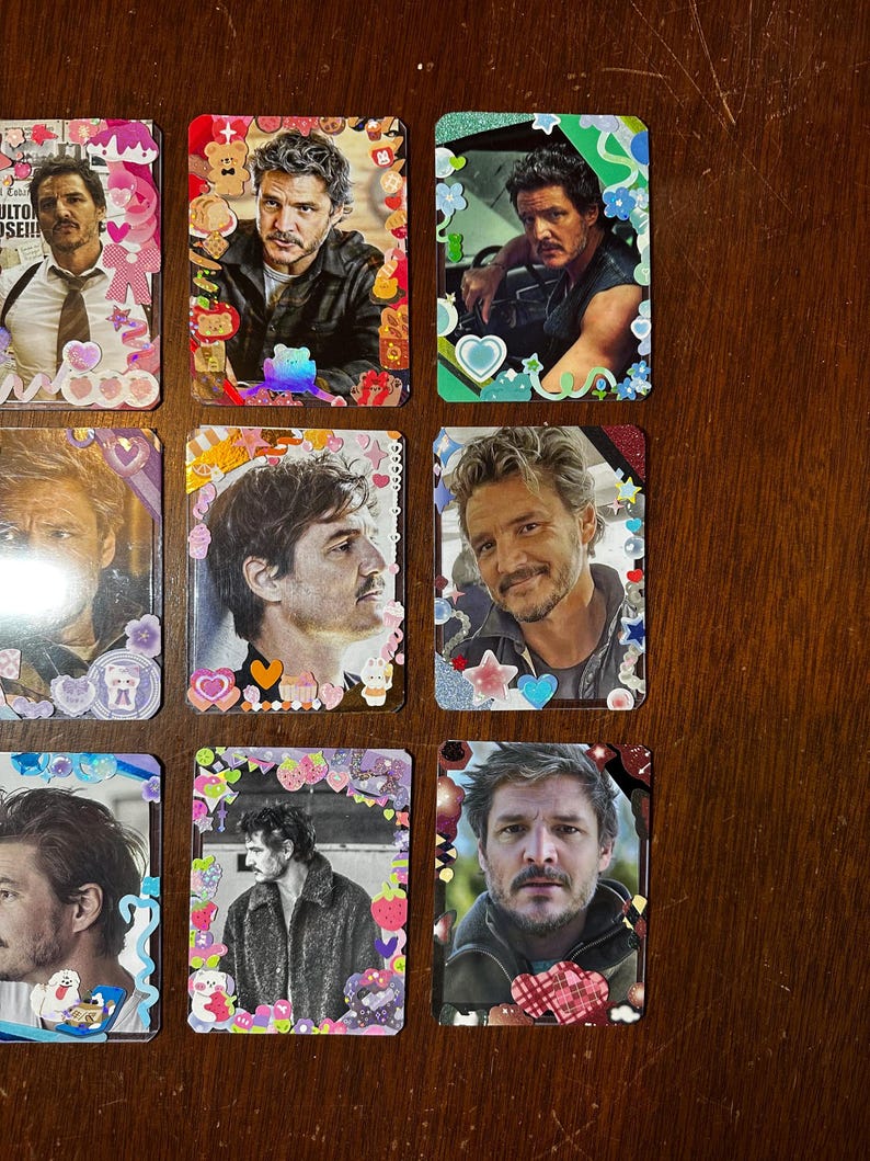 May include: Nine colourful cards featuring the same man on each card. The cards have different borders with various colours, glitter, and cartoon characters.