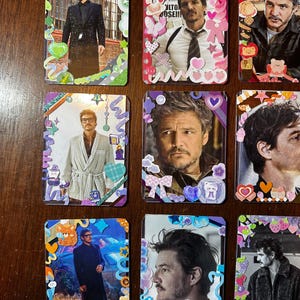 May include: Nine colourful cards featuring different images of a man with various hairstyles and outfits. Each card has a different border with colourful cartoon stickers and hearts.
