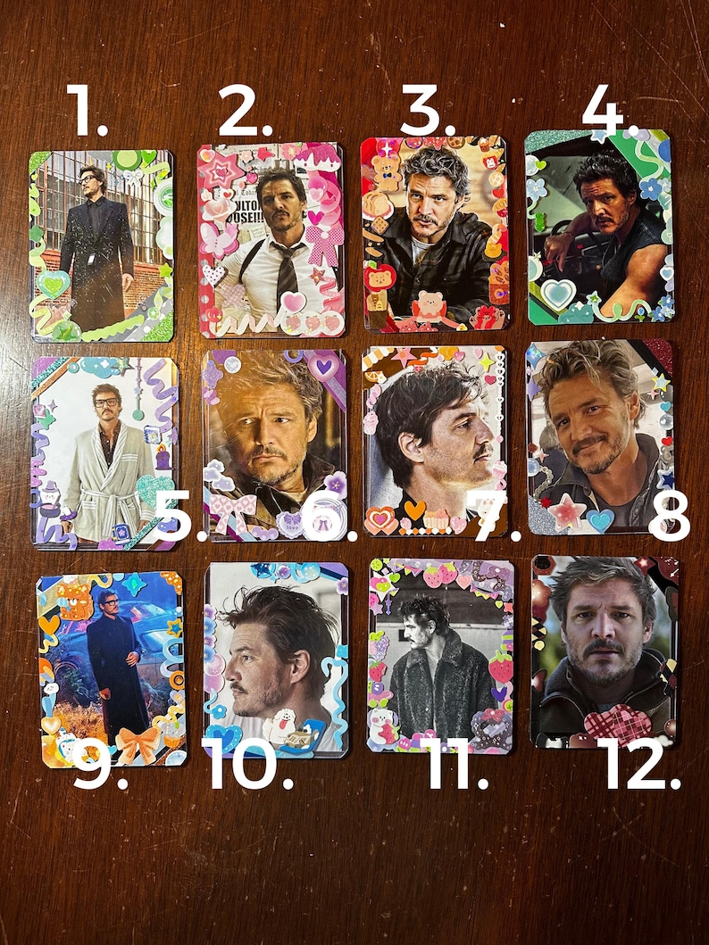 May include: Twelve colourful cards featuring different images of a man. Each card has a number on it, from 1 to 12. The cards are decorated with stickers and glitter.