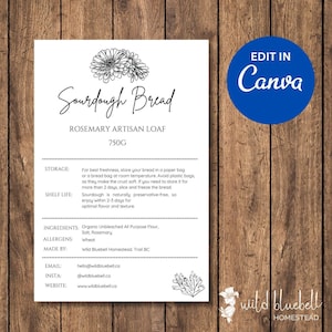 May include: A white label with black text and a black and white illustration of a flower. The label is for sourdough bread with rosemary. The label includes the text "Sourdough Bread", "Rosemary Artisan Loaf", "750g", "Storage", "Shelf Life", "Ingredients", "Allergens", "Made By", "Email", "Insta", "Website", and the following information: "For best freshness, store your bread in a paper bag or a bread bag at room temperature. Avoid plastic bags, as they make the crust soft. If you need to store it for more than 2 days, slice and freeze the bread. Sourdough is naturally preservative-free, so enjoy within 2-3 days for optimal flavor and texture."