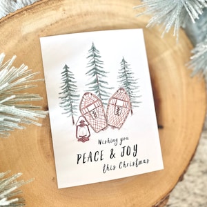 Tarjeta de Navidad de acuarela pintada a mano / Tarjeta de Navidad vintage con raquetas de nieve / Tarjeta navideña de linterna roja / Tarjeta de Navidad de paz y alegría