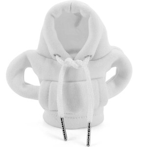 May include: A white miniature hoodie with a drawstring and silver-colored metal aglets. The hoodie has a hood and sleeves, and is made of a soft, textured fabric. The design is a novelty item.