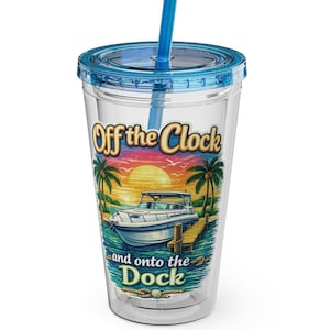 May include: A clear plastic tumbler with a blue lid and straw. The tumbler features a graphic of a boat at a dock with palm trees and a sunset, and the text "Off the Clock and onto the Dock."