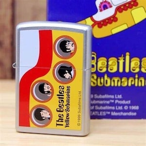 Raro encendedor Zippo retirado de los Beatles Yellow Submarine Portholes en lata con funda
