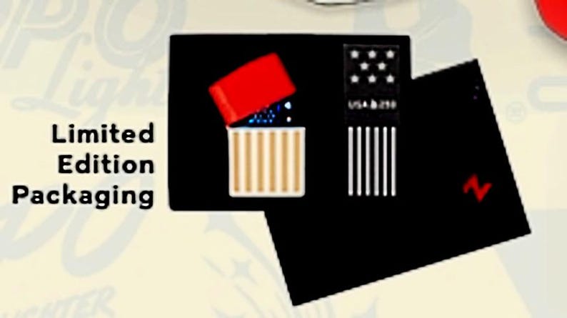 May include: Limited Edition Packaging showing a red-topped lighter with a gold and white striped design, open to reveal blue contents. A black card displays a US flag design and the text "USA b 250". A red "N" is visible.