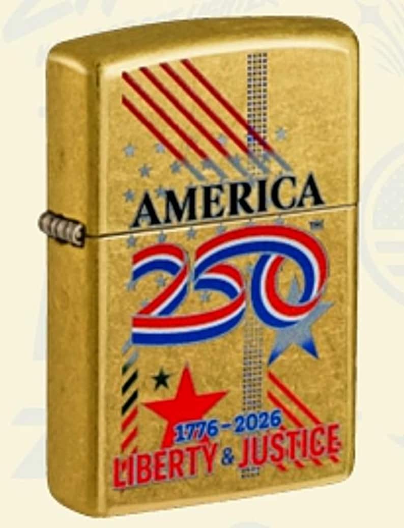 May include: A gold-colored lighter with the word "AMERICA" and the number "250" in red, white, and blue. The lighter also features the text "1776-2026" and "LIBERTY & JUSTICE" in red. The design includes stars and stripes.