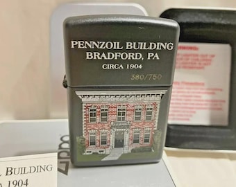 Encendedor Zippo PENNZOIL Building Bradford 1904 sellado de 1998 con lata 380/750