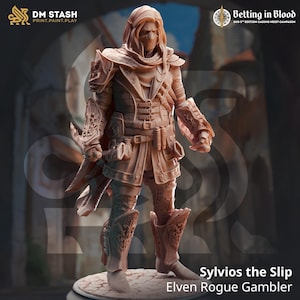 May include: A detailed miniature figurine of an elven rogue gambler, painted in a light brown color, wearing a hooded cloak, armor, and holding a dagger. The figurine is standing on a stone base. The text "Sylvios the Slip" and "Elven Rogue Gambler" is printed below the figurine.