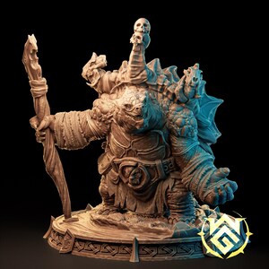 May include: A detailed, beige fantasy figurine of a large humanoid creature holding a staff and with skulls on its head. The creature has a textured, reptilian appearance, with armour and a base with decorative carvings. The image is set against a dark background.
