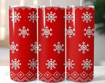 Könnte beinhalten: Drei rote Edelstahlbecher mit weißen Schneeflocken-Designs und einem Strickmuster. Die Becher haben einen weißen Rand und Boden.