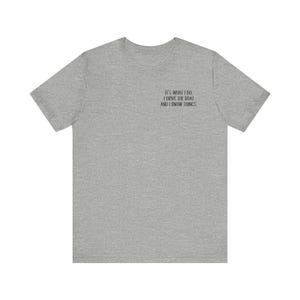 May include: A heather gray t-shirt with the text "It's what I do. I drive the boat and I know things."