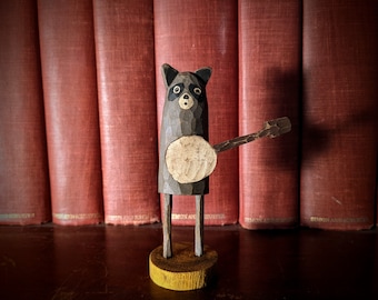 Banjo Raccoon Wooden Figurine