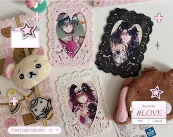 May include: Three rectangular card frames with heart-shaped cutouts featuring anime-style illustrations, accompanied by two plush animal heads, a small beaded charm, and a digital-style reminder pop-up window with the text #LOVE.