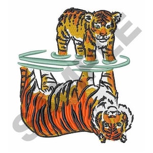 May include: An orange and black tiger cub stands on a reflection of a larger tiger in water. The larger tiger is upside down and appears to be swimming.