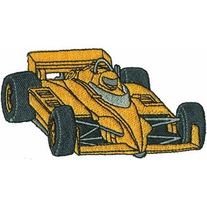 May include: A yellow and black racing car with a driver in the cockpit. The car has a large spoiler and a distinctive design.