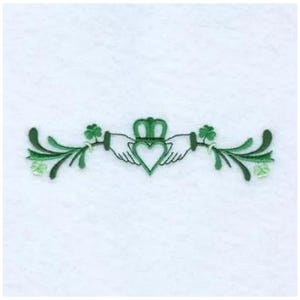 May include: Green embroidered design of two hands clasped around a heart with a crown on top, with green shamrock leaves on either side.