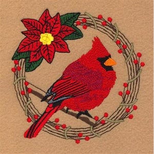 May include: Embroidered design of a red cardinal perched on a branch with red berries, surrounded by a wreath of green leaves and red berries. A red poinsettia flower is on the left side of the design.