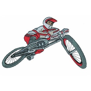 May include: An embroidered patch depicting a person riding a dirt bike. The rider is wearing a red and white racing suit and a helmet. The bike is grey and has a red rim.