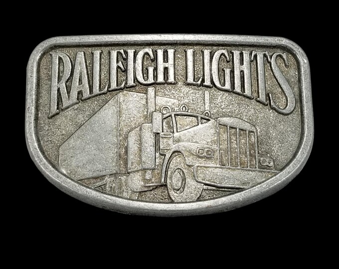Vintage Raleigh Lights Semi Truck Belt Buckle Pewter Tone Tobacco Memorabilia