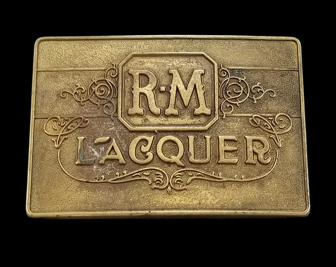 Vintage RM Lacquer Brass Tone Belt Buckle PMC Promotional Marketing Concepts
