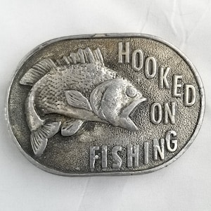 Vintage Belt Buckle 1977 Hooked On Fishing USA Made By Capt. John&#39;s Diying Locke