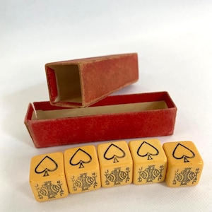 A set of Vintage French Bakelite Poker Dice Set out of the late 1930&#39;s in their original carton.