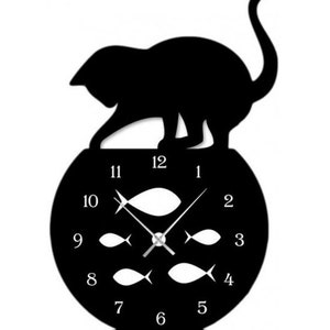 May include: Black silhouette of a cat sitting on a black clock face with white numbers and fish cutouts. The clock hands are silver.