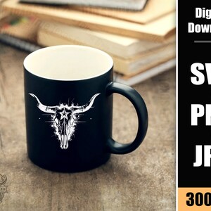May include: A black coffee mug with a white graphic of a stylized bull skull with a star on its forehead. The mug is on a wooden surface. Digital Download: SVG, PNG, JPG, 300 DPI.