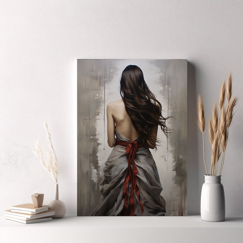 May include: A painting of a woman with long brown hair wearing a flowing grey dress with a red ribbon tied around her waist. The background is a muted grey with brushstrokes.