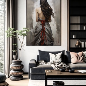 May include: A painting of a woman with long brown hair wearing a flowing gray dress with a red ribbon tied around her waist. The painting is set against a muted background with brushstrokes visible.